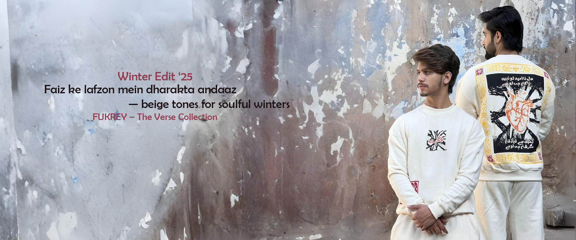 Two people standing in front of a textured wall with text overlay about a winter fashion collection.